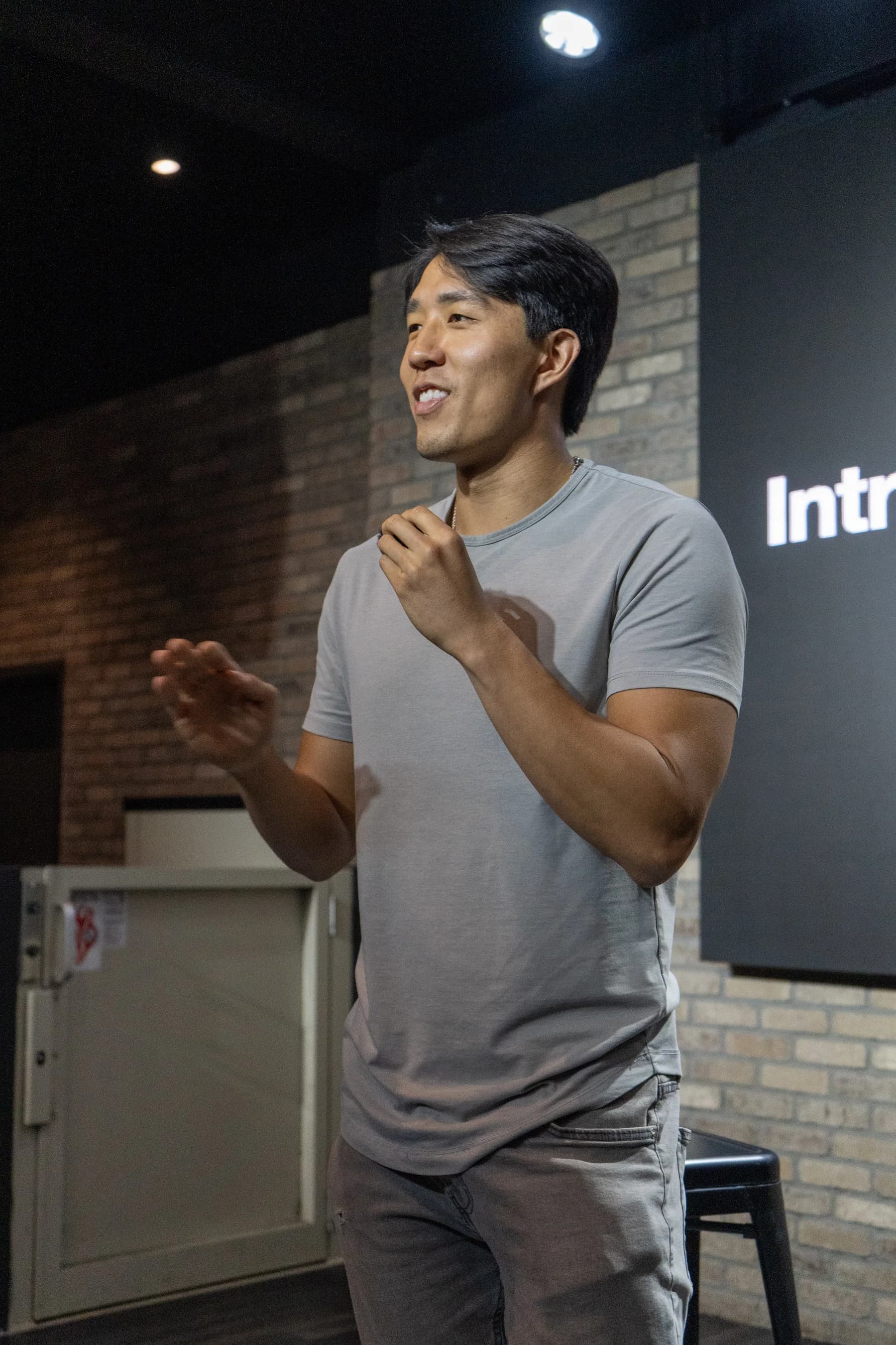 Jeff Tang speaking onstage